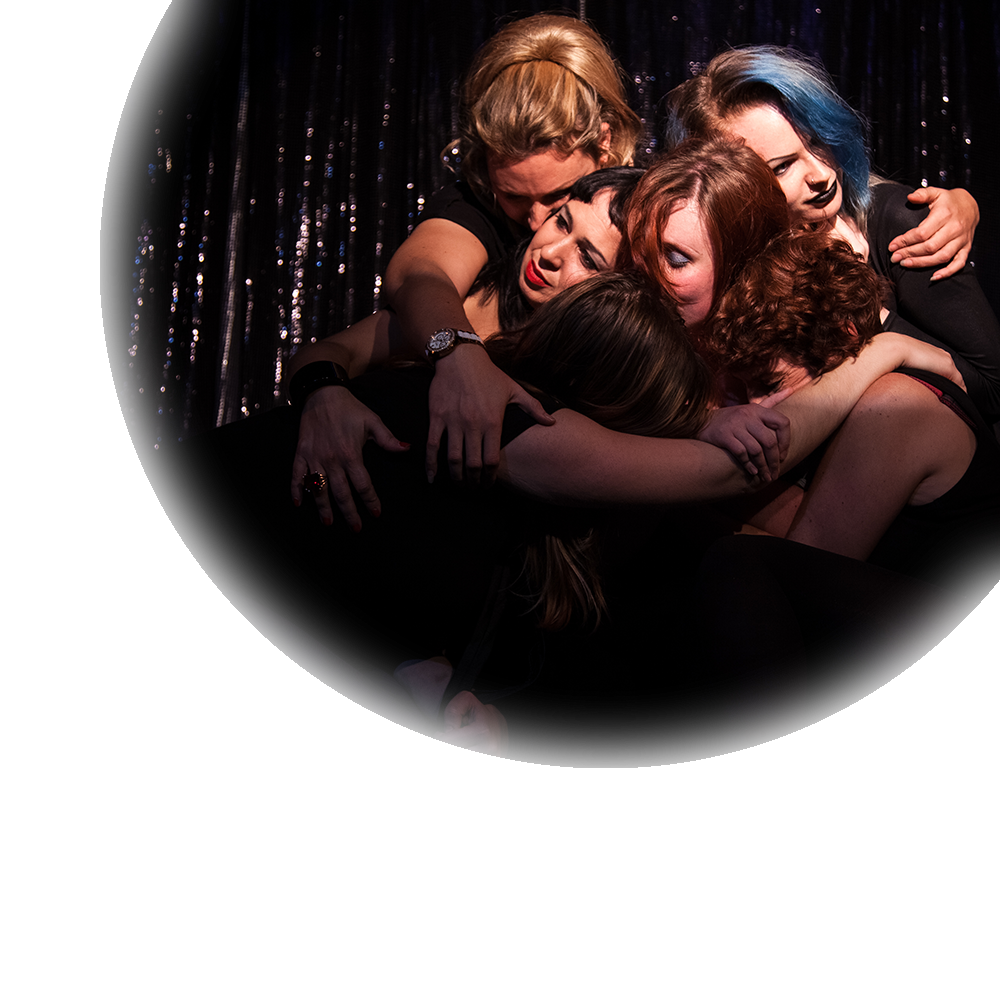 Photo of our cast hugging from the 2014 teaser performance at Bar Wotever at the Vauxhall Tavern